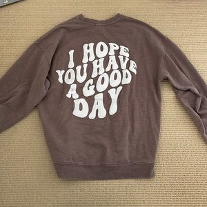 Garage Crew neck with writing on the back.